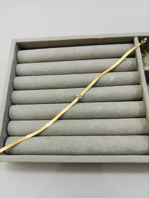 PULSEIRA LAMINADA COM CRISTAL DE GOTA BANHADO A OURO - Imagem 2
